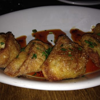 Cane and Table - Cangejitos- Louisiana blue crab stuffed fried goodness. Also recommend to share. Like a super charged Rangoon - Cocktail Bars Near Me - New Orleans, Louisiana
