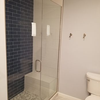 Precision Shower Doors - New 3/8" custom shower door in Brushed Nickel hardware and clear glass. - Glass & Mirrors Near Me