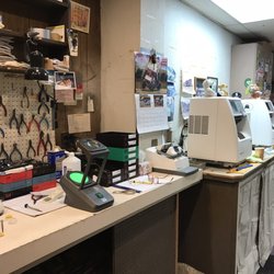 Bergelt Opticians - Shop with lens cutting machines