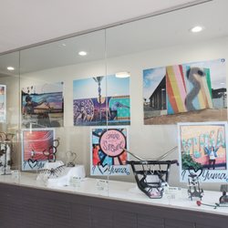 Yuma Visitors Bureau - Window display featuring local artists
