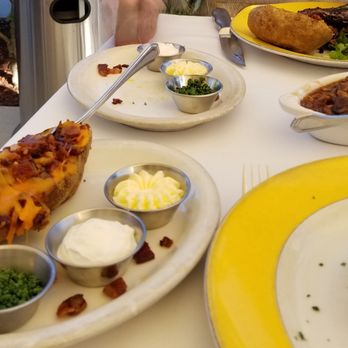 Cole's Chop House - Entrees with family-style sides.  The baked potato was huge--half was more than enough for each of us! - Steakhouses Near Me - Napa, California