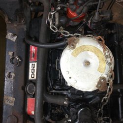 On-Site Service and Repair - Mercruiser marine engine being repaired