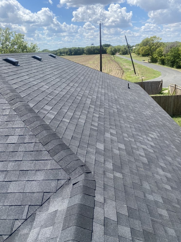 Slide of Regio's Roofing