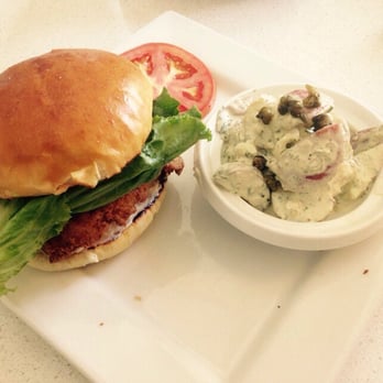 George's At Alys Beach - Famous fried grouper sandwich with roasted red potato salad - New American Near Me - Alys Beach, Florida George's At Alys Beach - Famous fried grouper sandwich with roasted red potato salad - New American Near Me - Alys Beach, Florida