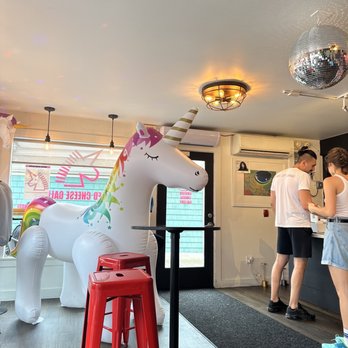 The Grilled Cheese Gallery - a white unicorn statue - Sandwiches Near Me - Provincetown, Massachusetts The Grilled Cheese Gallery - a white unicorn statue - Sandwiches Near Me - Provincetown, Massachusetts