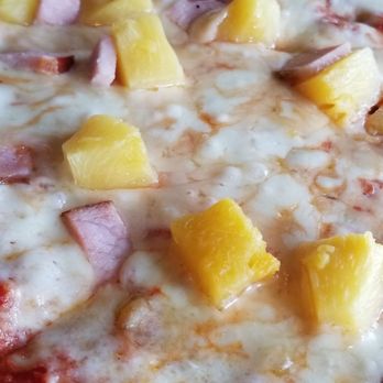 The Tomato Cafe - Pineapple chunks right where they belong, on a pizza surrounded by cheese, sauce and ham! - Pizza Near Me - Fishkill, New York