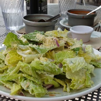Tinleaf Fresh Kitchen - Romaine hearts with avocado, toasted almonds, onions, parmesan, cucumbers and boring basil green goddess dressing. - New American Near Me - Carlsbad, California Tinleaf Fresh Kitchen - Romaine hearts with avocado, toasted almonds, onions, parmesan, cucumbers and boring basil green goddess dressing. - New American Near Me - Carlsbad, California