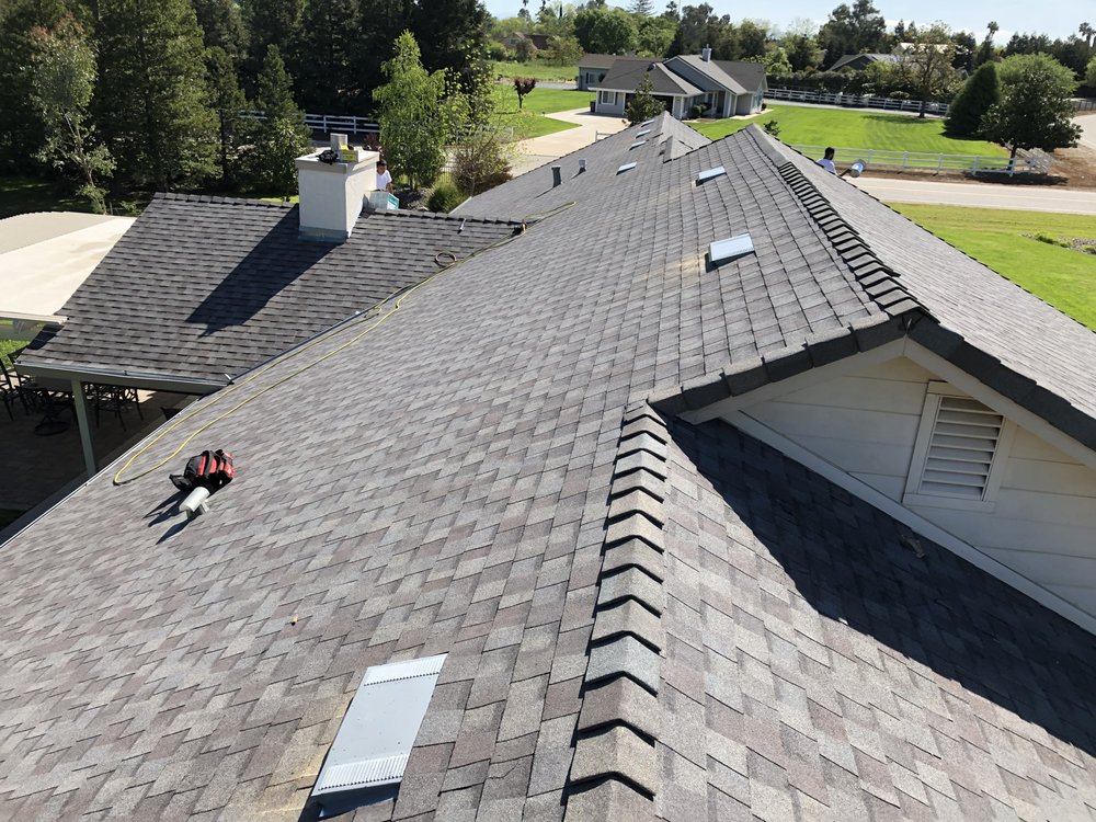 Slide of New Era Roofing