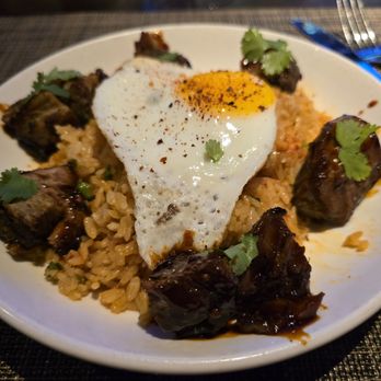 Thirsty Lion - Korean pork belly with kimchi fried rice. - American Near Me - Euless, Texas