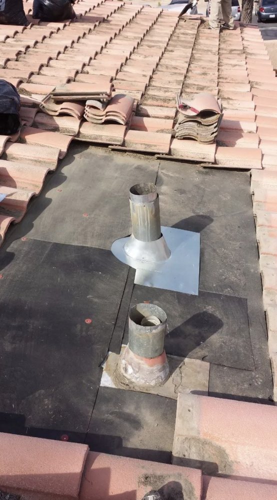 Slide of Romero's Roofing