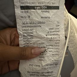 This is what we paid for 2 beers, an order of wings and a fry +$20 gratuity   This was not our only check for the night.