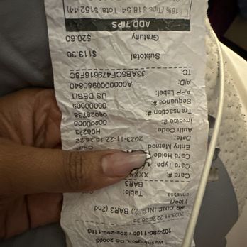 Ginza Karaoke BBQ Lounge - This is what we paid for 2 beers, an order of wings and a fry +$20 gratuity   This was not our only check for the night. - Barbeque Near Me - Washington, DC, District of Columbia