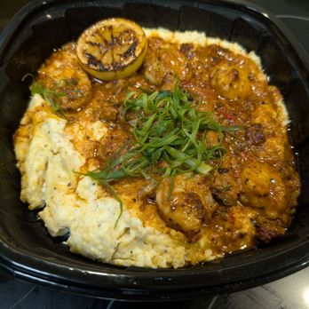 Tupelo Honey Southern Kitchen & Bar - Shrimp and grits. - New American Near Me - Huntsville, Alabama Tupelo Honey Southern Kitchen & Bar - Shrimp and grits. - New American Near Me - Huntsville, Alabama