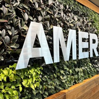 The Centurion Lounge - American Express signage at entrance: Living plant wall at the entrance - Airport Lounges Near Me - Denver, Colorado The Centurion Lounge - American Express signage at entrance: Living plant wall at the entrance - Airport Lounges Near Me - Denver, Colorado