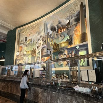 Conwell Hall - Full view of the teller windows and the beautiful painting behind it. - Cafes Near Me - New York, New York