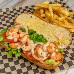 Fish & Chicks - Grilled shrimp poboy seasoned fries