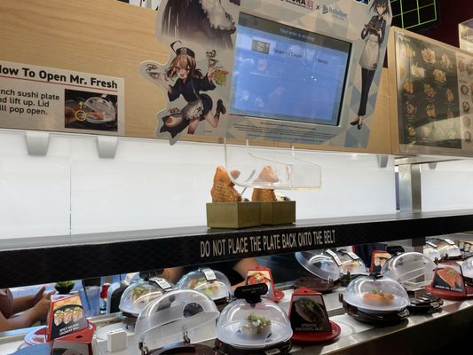 Kura Revolving Sushi Bar by null