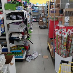 Dollar General - This is how Dollar General looks to a customer. This is just one aisle. The entire store looks like this and worse.