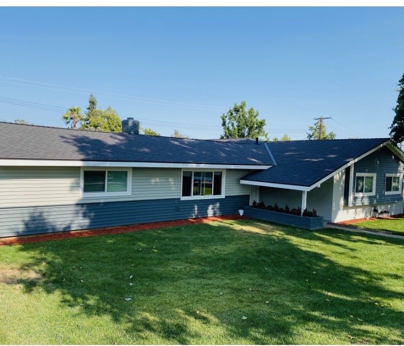 Slide of The Roofing Company