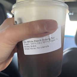 Cm White Peach Oolong Tea + honey boba Cm White Peach Oolong Tea + honey boba