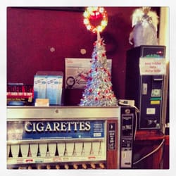 Sandbar Tavern - One of the few cigarette machines still around & decorated for the holidays!