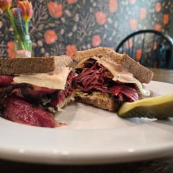 Ghost Dog Deli - Hot pastrami with Swiss cheese on artisan rye bread. Yum!