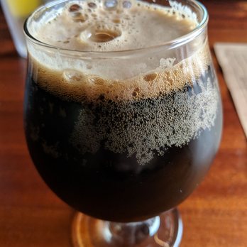 Dogfish Head Brewings & Eats - Bourbon Barrel Aged Palo Santo Marron - American Near Me - Rehoboth Beach, Delaware
