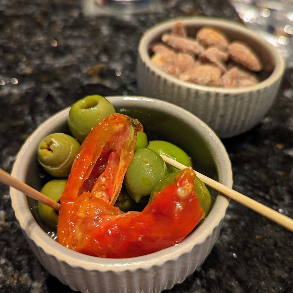 The Umstead Hotel - Green olives, red peppers, and salted almonds at the Umstead hotel bar. - Hotels Near Me - Cary, North Carolina
