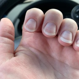 Uneven. Not filed correctly or completely.