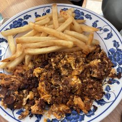 Chorizo. Egg with the order of fries.