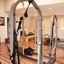 Satya Yoga & Pilates - We keep our Pilates Reformer classes to a small group so that our instructors can provide individualized attention to all of our students.