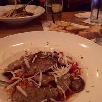 Agliolio - Their tomato basil pasta with a slightly spicy pink white wine sauce. - Italian Near Me - Boynton Beach, Florida Agliolio - Their tomato basil pasta with a slightly spicy pink white wine sauce. - Italian Near Me - Boynton Beach, Florida