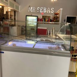 a counter with a variety of food items a counter with a variety of food items