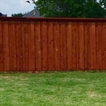 Xtreme Fencing - Board on board with cap and trim in redwood stain - Fences & Gates Near Me - Burleson, Texas Xtreme Fencing - Board on board with cap and trim in redwood stain - Fences & Gates Near Me - Burleson, Texas