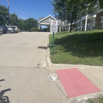 Cornerstone Commons - This is the sidewalk that the city inspector said needed fixed immediately. Manager drove by it for a year never noticed it - Apartments Near Me - Johnston, Iowa