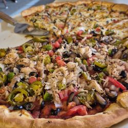 Arthur’s Pizza - XL (truly X-large) veggie pizza, half cheese, half no cheese with sauerkraut, was absolutely delicious!