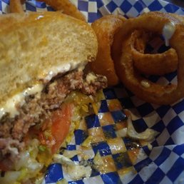 Black and blue burger with onion rings