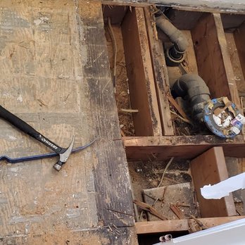 Ibarra's Handyman Services - Water damaged floor - in process of removing damaged tiles and wood. - Drywall Installation & Repair Near Me Ibarra's Handyman Services - Water damaged floor - in process of removing damaged tiles and wood. - Drywall Installation & Repair Near Me