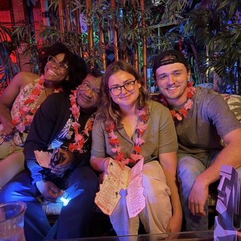 The Red Lei Lounge - Hanging on the couch ordering food. - Tiki Bars Near Me - Jacksonville, Florida