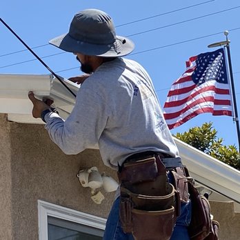 Drip Gutters Service - Francisco making one of the corner pieces - Gutter Services Near Me