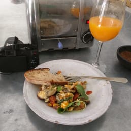 Huevos revueltos and a fresh glass of OJ Huevos revueltos and a fresh glass of OJ