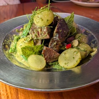 Talat Market - Grilled Beef Salad. $28. Coconut, lemongrass, grape, mint. - Thai Near Me - Atlanta, Georgia Talat Market - Grilled Beef Salad. $28. Coconut, lemongrass, grape, mint. - Thai Near Me - Atlanta, Georgia