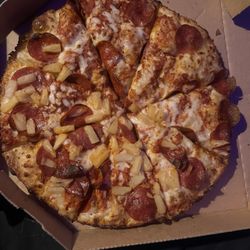 Domino's Pizza - It is supposed to be half pineapple. Whole pizza pepperoni.