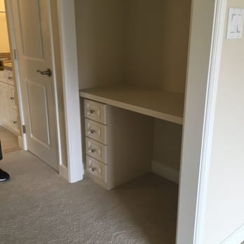 RC Cabinets and Closets - Roberta & Chris created a built in desk, with drawers to the left. Desk is a laminate that matches the color of the apartment. - General Contractors Near Me - Cotati, California