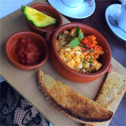 Olive Oil & Butter - Fusturon (scrambled eggs with feta, avo, salsa and sourdough)