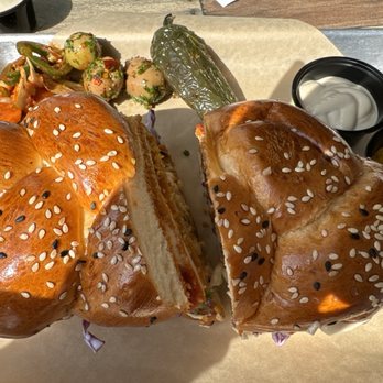 Hamitbach - Schnitzel in Challah Plate - Mediterranean Near Me - San Diego, California Hamitbach - Schnitzel in Challah Plate - Mediterranean Near Me - San Diego, California