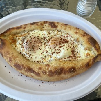 Araz Bakery - Adjarski or Ajarakan egg boat sandwich. The crust is stuffed with cheese. - Armenian Near Me - Fresno, California