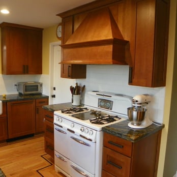 Tall Tree Remodeling - a kitchen with a stove and sink - General Contractors Near Me Tall Tree Remodeling - a kitchen with a stove and sink - General Contractors Near Me