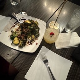 Brussels sprouts appetizer, espresso martini, and the "let's get lei'd" drink