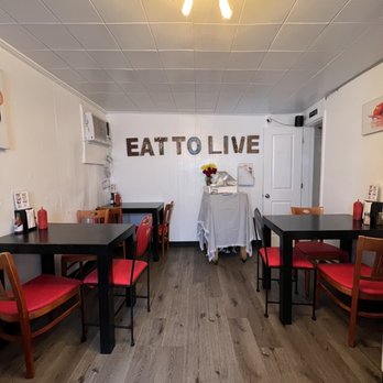 Vegelicious - a dining room with tables and chairs - Vegan Near Me - Nashville, Tennessee Vegelicious - a dining room with tables and chairs - Vegan Near Me - Nashville, Tennessee